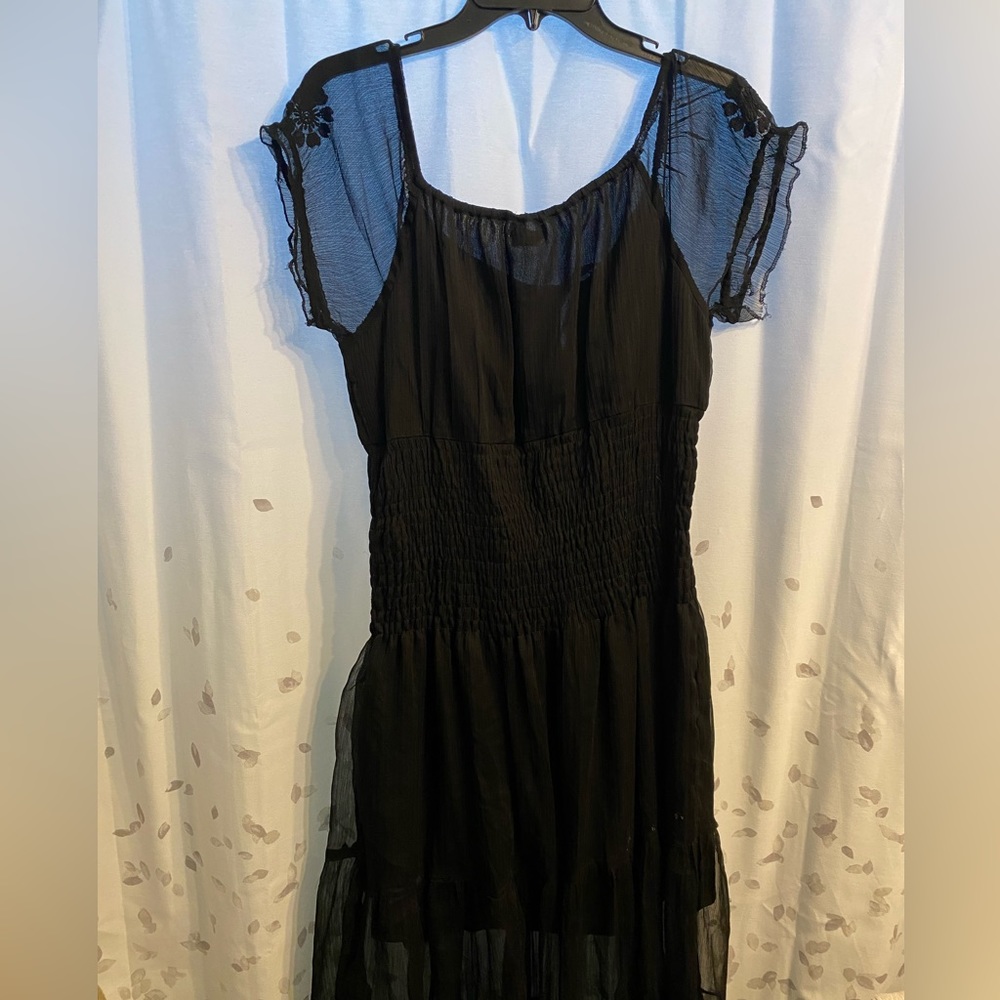 Long black boho dress.